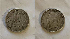 Tu mai ai așa ceva acasă? Prețul la care se vinde o monedă de 250 de lei, veche de 8 decenii