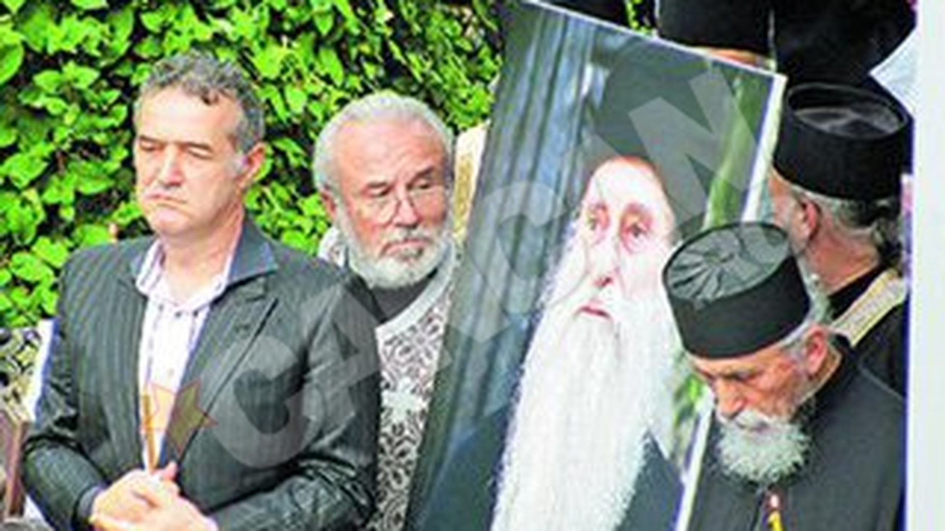S-a rupt cerul la inmormantarea parintelui Papacioc