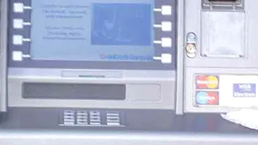 Trei romani, condamnati la inchisoare in Abu Dhabi pentru fraude la ATM-uri