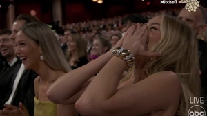 Cum a reacționat Margot Robbie când l-a văzut pe John Cena dezbrăcat pe scenă la Gala Premiilor Oscar 2024