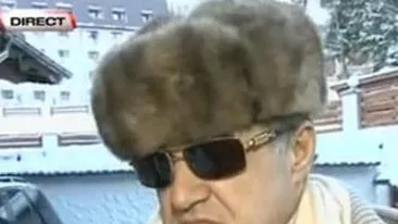 Gigi Becali lanseaza moda cu caciula de astrahan si ochelari de soare! Uite-l cat de tare poate sa arate