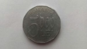 Mai ții minte celebra monedă de 5.000 lei din anul 2002?! Cu ce preț se vinde acum, în martie 2023