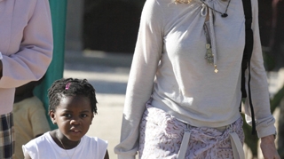 Madonna refuza ca presupusul tata al fiicei sale adoptive sa o vada pe aceasta