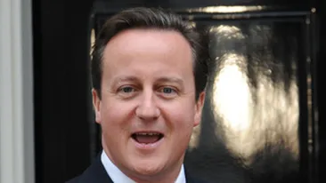 Premierul britanic, umilit de o chelnerita