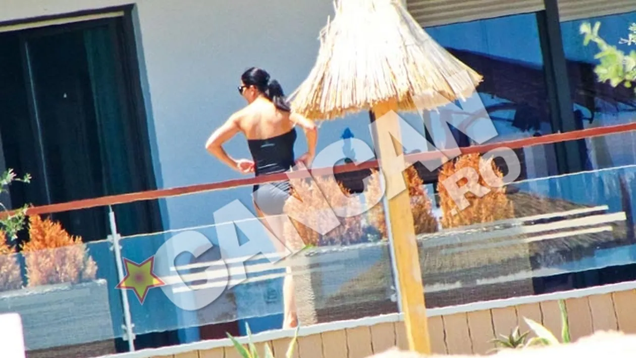 Impecabila in costum de baie! Brigitte Sfat, sexy pe balconul apartamentului de la Mamaia!