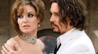 Angelina Jolie, motivul despartirii dintre Johnny Depp si Vanessa Paradis!