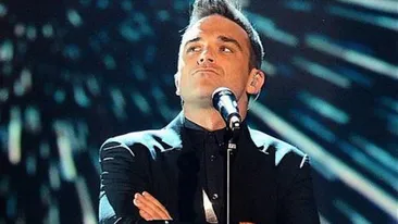 Robbie Williams a primit un ULTIMATUM din partea colegilor de trupa! Ce decizie importanta trebuie sa ia