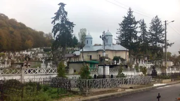 Scandal cu focuri de armă în cimitirul din Moreni. Preotul s-a certat cu doi enoriași