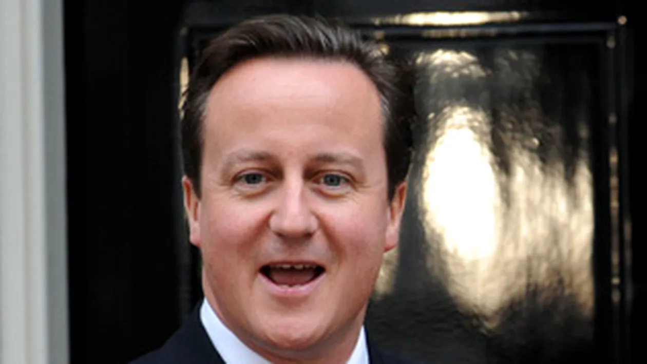 Premierul britanic, umilit de o chelnerita