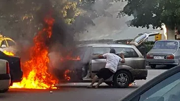 Bărbat rănit într-o parcare din Pitești, în timp ce încerca să mute o mașină care ardea