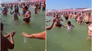 Imagini incredibile la Eforie. Oamenii au dansat în mare, cu boxa și paharele de bautură după ei | VIDEO