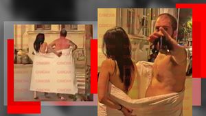 Scene nebune cu doi îndrăgostiți dezbrăcați pe stradă. Amorezii au ieșit la plimbare acoperiți numai cu un cearșaf