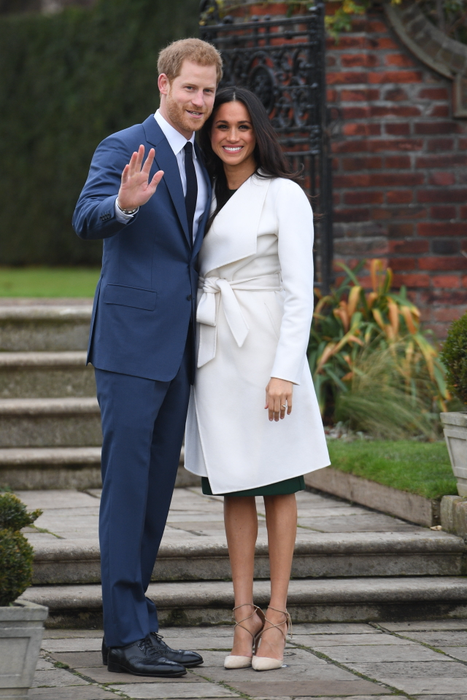 Prince Harry and Meghan Markle stepped out in public for the first time this afternoon after the world celebrated news of their engagement. The Prince and Ms Markle appeared in the Sunken Garden of Kensington Palace, near the cottage which they will eventually call home, in front of the world's media jostling for the first glimpse of the happy couple. Ms Markle also showed off her engagement ring for the first time. Harry is said to have designed the ring using gems from a brooch that belonged to his late mother. It features three diamonds - one is said the be from Botswana and two from Princess Dianas collection.

© Jeremy Selwyn / Evening Standard / eyevine

Contact eyevine for more information about using this image:
T: +44 (0) 20 8709 8709
E: info@eyevine.com
http://www.eyevine.com
  November 27, 2017  Prince Harry And Meghan Markle Engagement  *** Local Caption *** 02011182