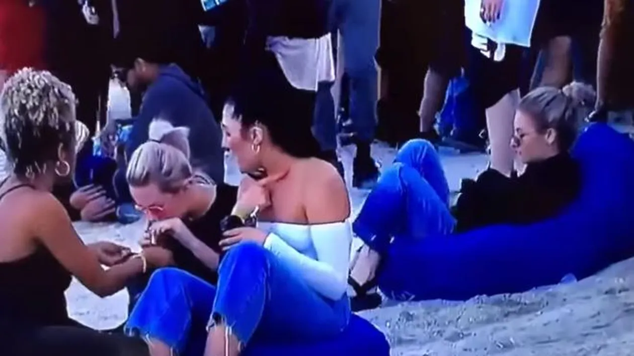 Tânăra care se droga pe plajă chiar în timpul unei transmisiuni LIVE este căutată de DIICOT