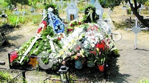 George Guraliuc isi doarme somnul de veci langa Maria si micuta Sabina. Ingropat la un centimetru de victimele sale