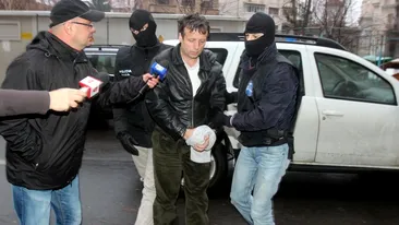 Hackerul român Guccifer, extrădat în SUA