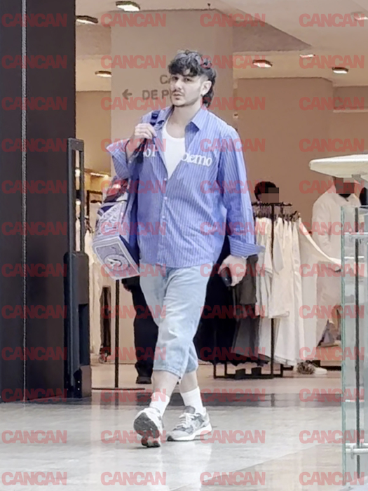 Malone defilează prin mall ca pe podium