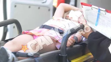 Fetita muscata de fata de cainele familiei! A fost operata de urgenta