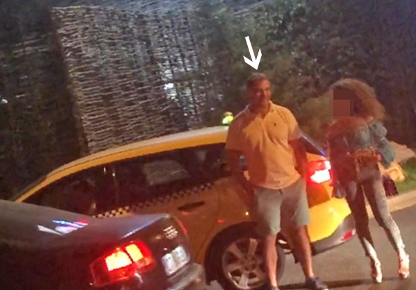 Ionuț Iftimoaie, “bodyguard” pentru o roșcată sexy.