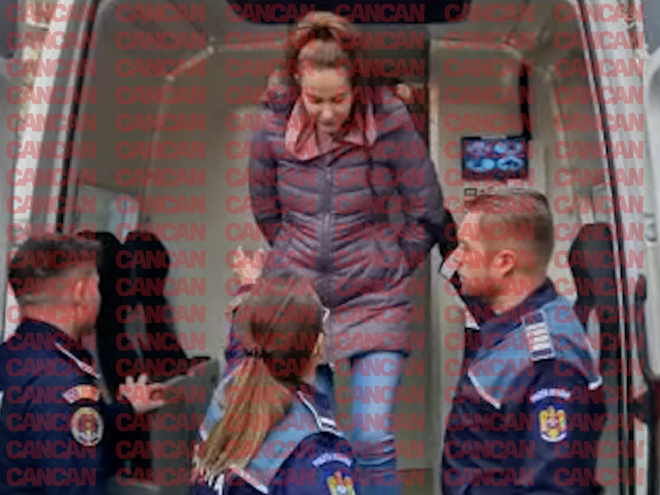Polițista Luana a fost încătușată cu mâinile la spate / (Sursa: CANCAN.RO)
