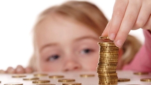 Cresc alocațiile în România. Proiectul de lege a fost promulgat prin decret prezidențial
