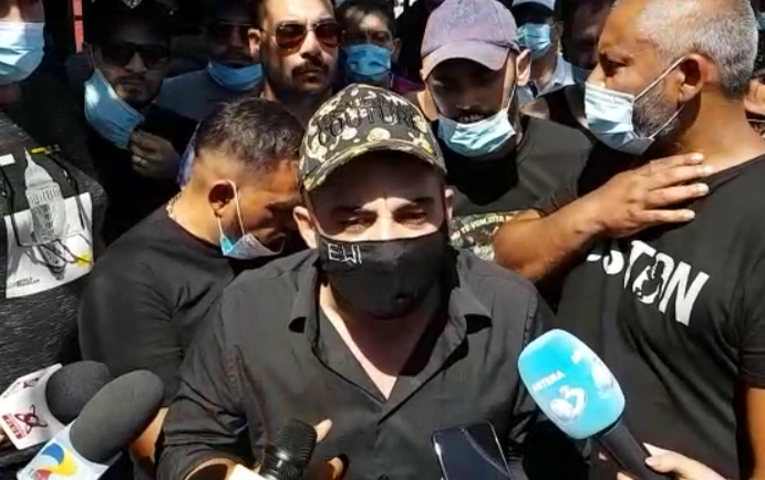 Fratele lui Emi Pian, dezvăluiri cutremurătoare lângă sicriu: ”Au vrut să mă omoare și pe mine acum trei ani!” Și-a arătat tăietura de pe gât VIDEO