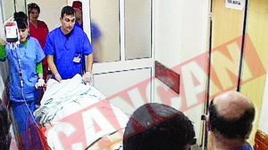 Un politist gelos s-a impuscat in burta