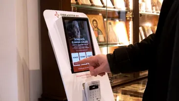 Cum arată prima „cutie a milei” electronică! Enoriașii pot face donații direct cu cardul