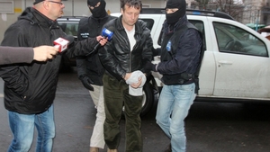 Hackerul român Guccifer, extrădat în SUA
