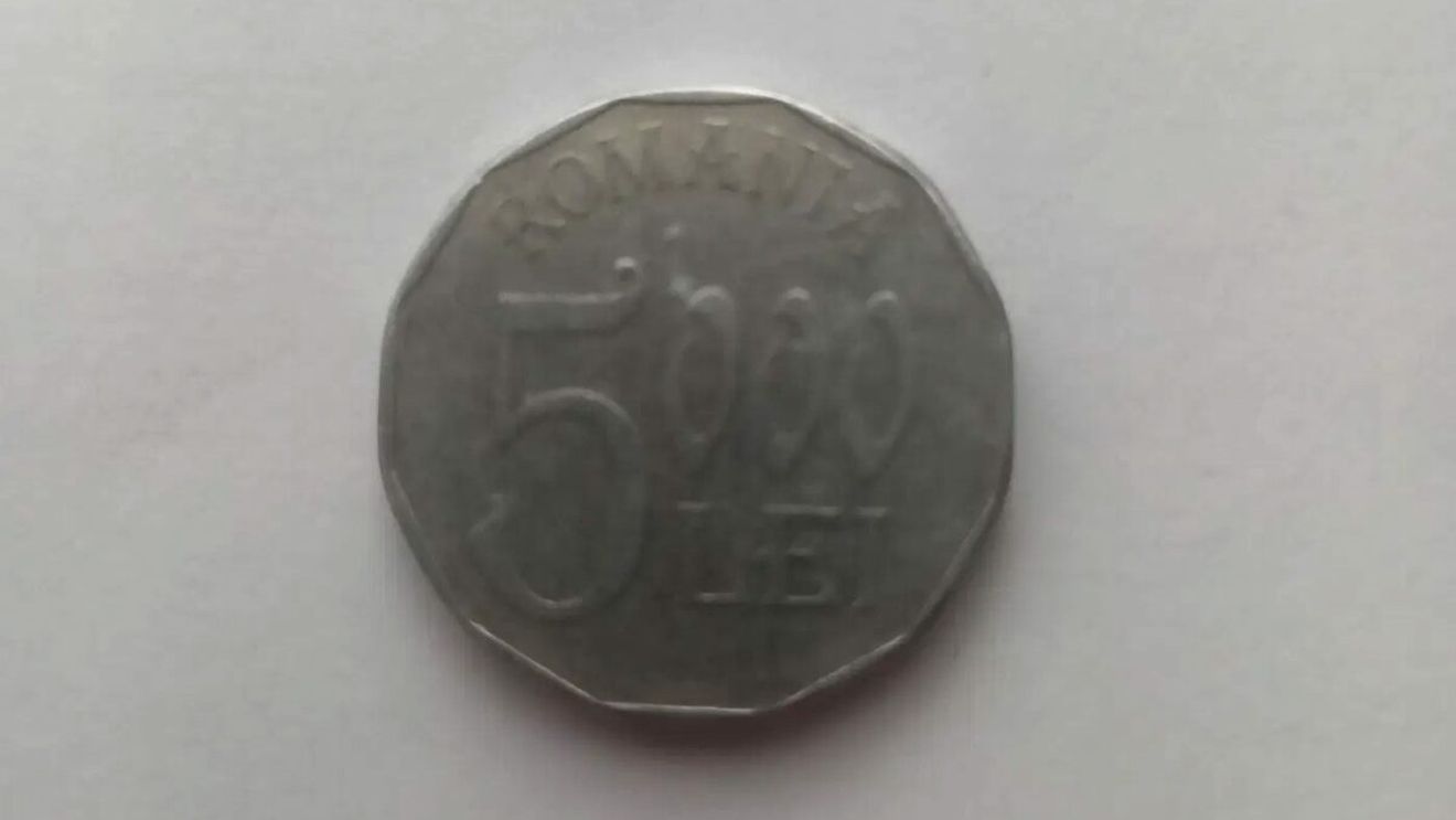 Mai ții minte celebra monedă de 5.000 lei din anul 2002?! Cu ce preț se vinde acum, în martie 2023