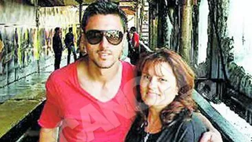 S-a linistit in bratele mamei