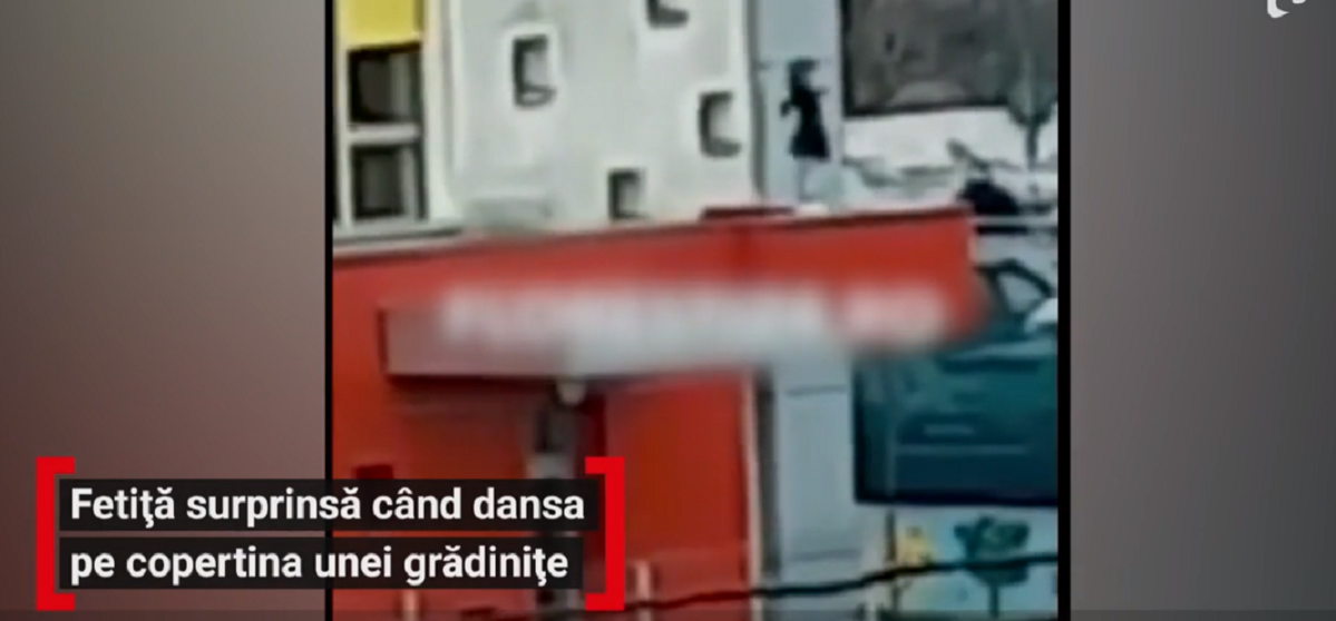 Imagini șocante! O fetiță de 5 ani din Cluj a fost filmată în timp ce dansează pe copertina unei grădinițe, la o înălțime de 3 metri