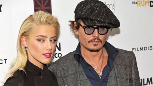Johnny Depp s-a casatorit civil cu Amber Heard