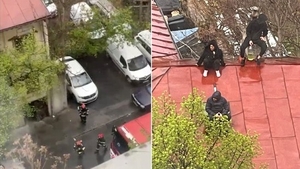 Trei persoane s-au urcat pe acoperișul unei clădiri din București și amenință că își dau foc. Echipajele ISU intervin la fața locului