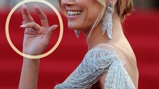 Heidi Klum a facut semne obscene pe covorul rosu. Ce-o fi apucat-o?