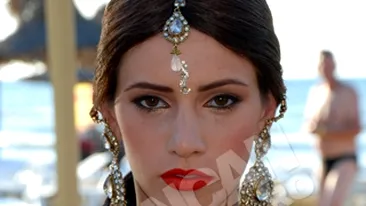 Concurenta tunsa zero la Next Top Model, cu peruca pentru o sedinta foto! Trebuia sa fie in rand cu celelalte fete