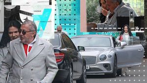 Ilie Năstase și soția lui și-au asortat paltoanele la Bentley și au ieșit la terasă