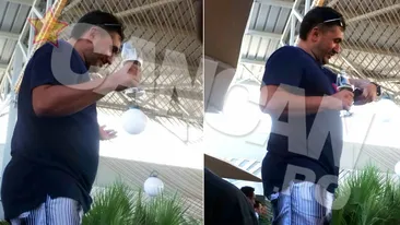 Imagini senzationale cu fabulosul bugetar Misu Pricopsitu! Si-a adus cubaneza la mare si au dansat pe mese intr-un club de fite!