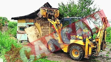 Pistol de 9 mm, gasit la demolarea unor maghernite