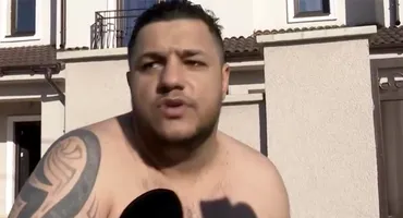 Alin Borcan, cu pușca în mână în fața casei, după percheziții. Ce a început să strige la reporteri: Au venit nişte hoţi cu cagule pe faţă şi...”