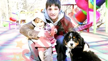 A pus sub brad un Ciobanesc de Berna