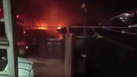 INCENDIU DE PROPORŢII pe o stradă din sectorul 5 al Capitalei! Mai multe case au luat foc! Una dintre victimele care au reuşit să se salveze: ”E iadul pe pământ!