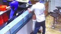 VIDEO / Doi tineri au făcut AMOR într-o pizzerie, fără să le pese de angajaţii care erau la câţiva paşi de ei! Ce pedeapsă riscă amorezii