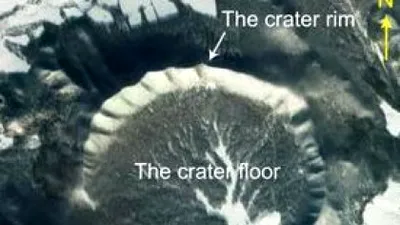 Crater de impact în formă de potcoavă, descoperit în...