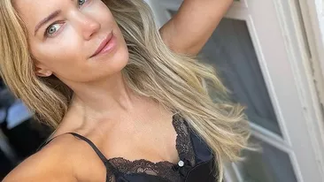 O prezentatoare TV celebră, surprinsă în ipostaze rupte din filmele pentru adulți, pe plajă. FOTO