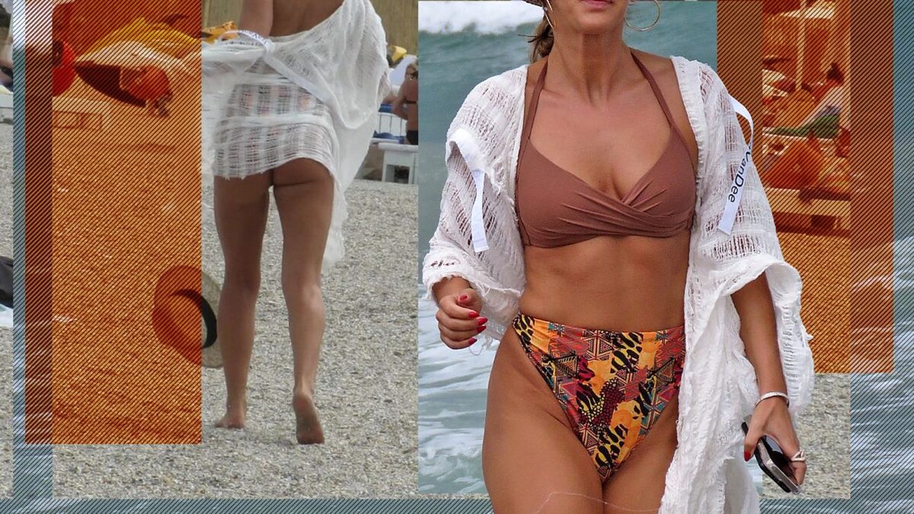 Blonda a rezolvat rapid ultima "lovitură" primită pe litoral. Denisa Nechifor, sexy și jucăușă, pe "plaja milionarilor"! S-a aplecat și...