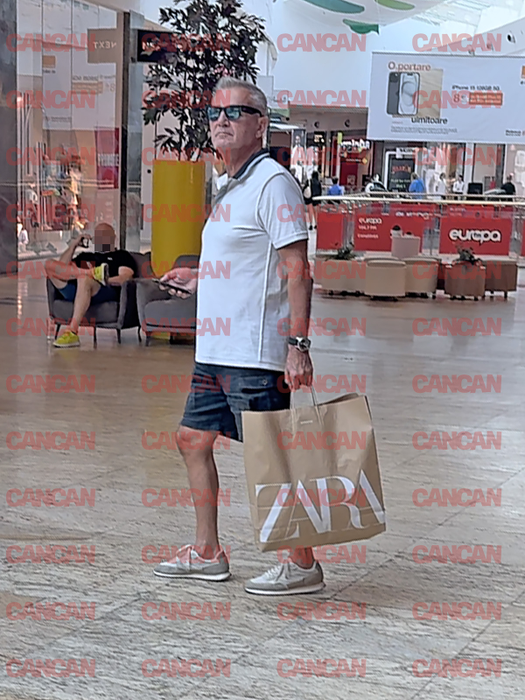 A plecat din magazin cu pungile pline Foto CANCAN.RO