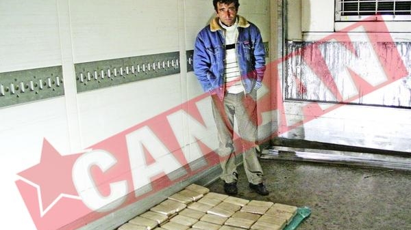 Peste 80 kg de heroina in camionul cu portocale