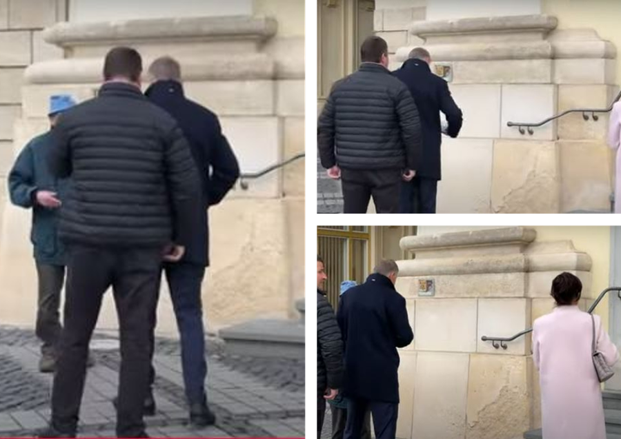 Momentul în care Klaus Iohannis îi oferă bani unui cerșetor. Sursă: Cluj Live TV