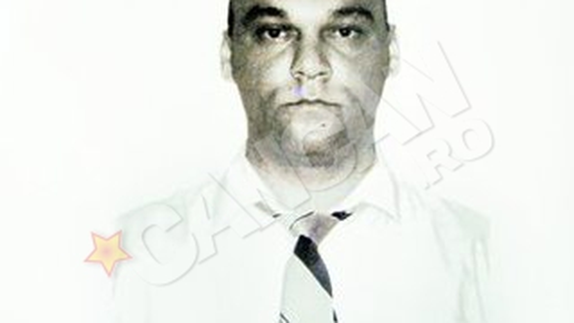 Un politist si-a executat parintii